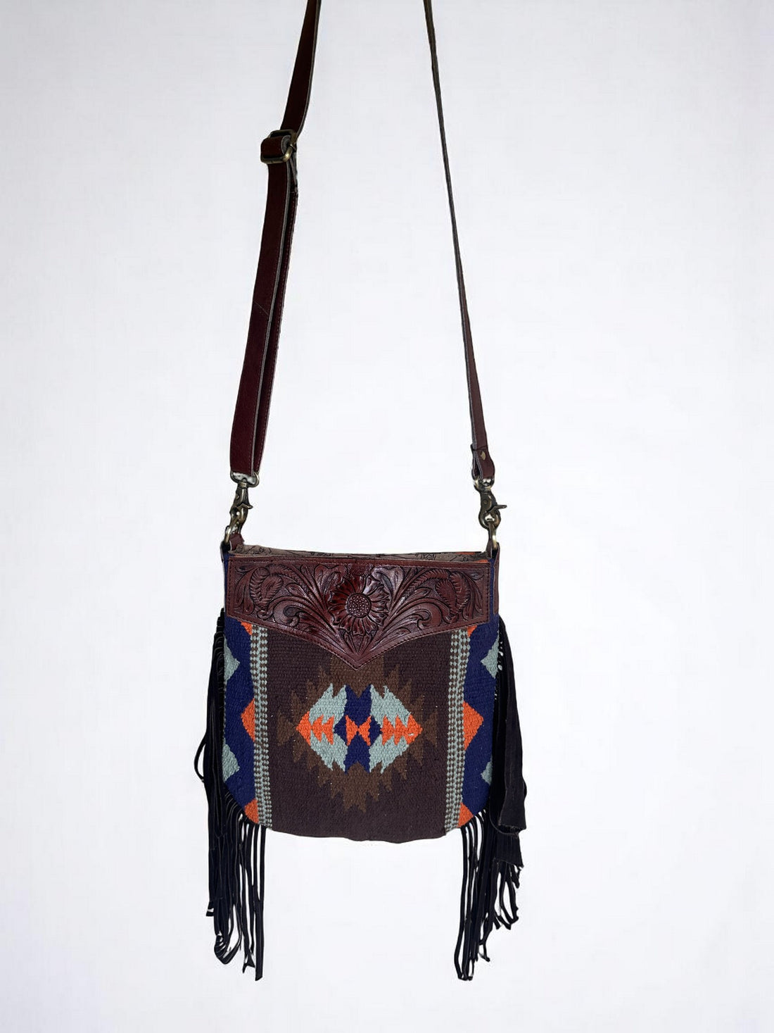 Crossbody Bag with Hand Tooled Patch and Fringes. 5399